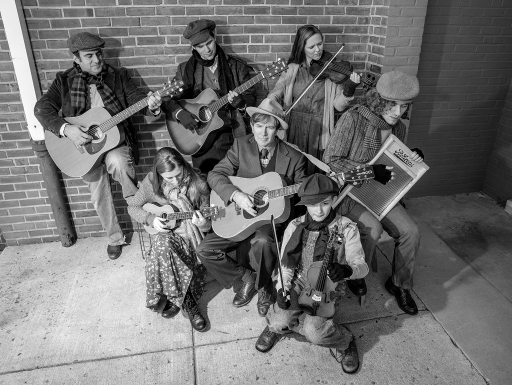 Tim Brown leads a bluegrass band: (left to right and top to bottom) Nick Manicone, Kyle McClain, Sara Maurer, Thomas Udlock, Ariana Colligan, Tim Brown and Shawn Hubbard. Photo by Rob Cuevas.