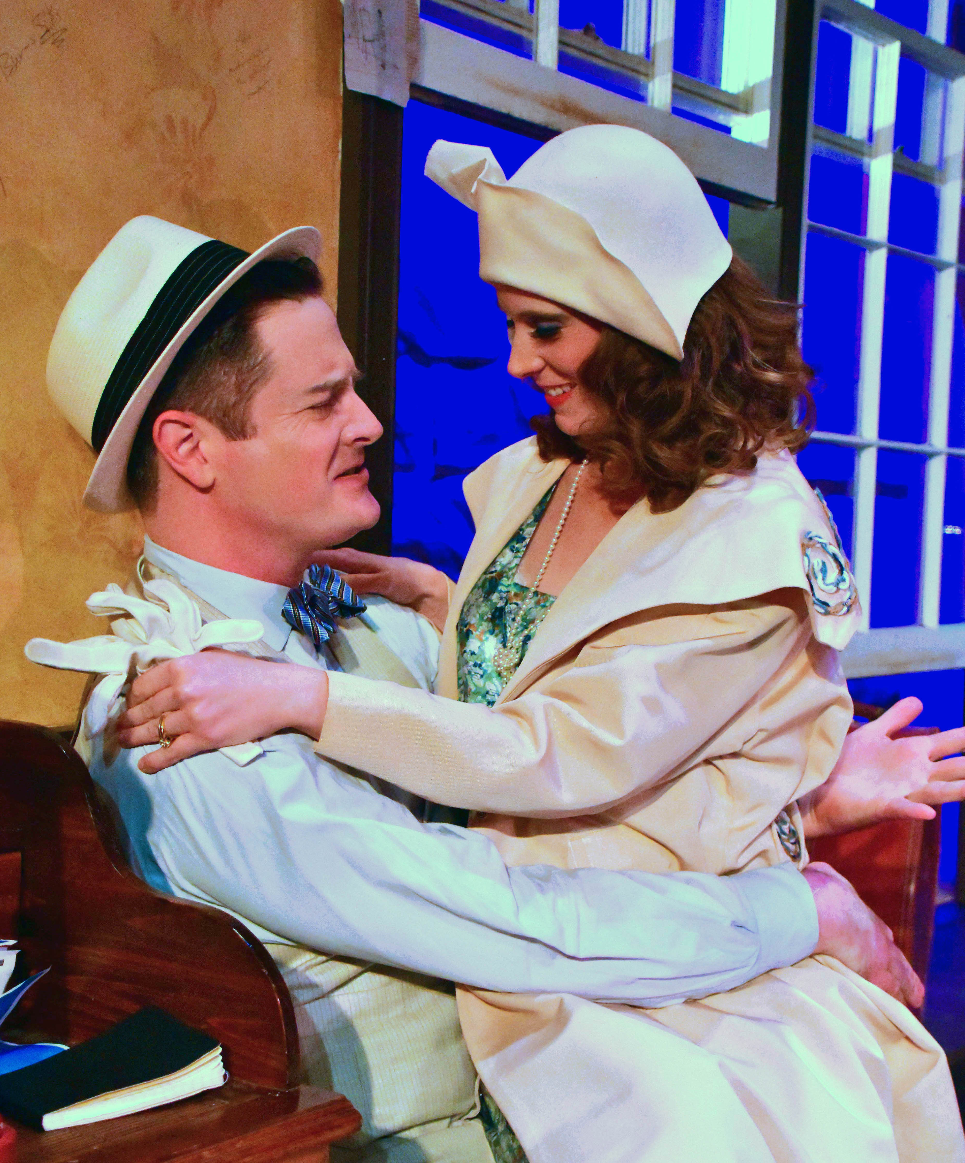 Chuck O'toole as Hildy Johnson and Jaclyn Robertson as Peggy Grant in the Providence Players production of The Front Page. Photo by Chip Gertzog, Providence Players